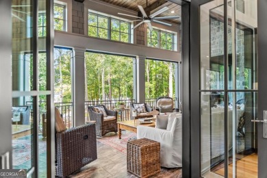 Escape to a private, peaceful lakefront sanctuary in Reynolds on Reynolds Lake Oconee - The Oconee in Georgia - for sale on GolfHomes.com, golf home, golf lot
