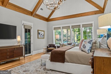 Escape to a private, peaceful lakefront sanctuary in Reynolds on Reynolds Lake Oconee - The Oconee in Georgia - for sale on GolfHomes.com, golf home, golf lot