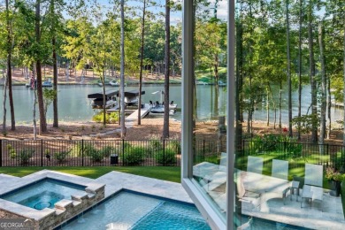Escape to a private, peaceful lakefront sanctuary in Reynolds on Reynolds Lake Oconee - The Oconee in Georgia - for sale on GolfHomes.com, golf home, golf lot