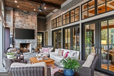 Escape to a private, peaceful lakefront sanctuary in Reynolds on Reynolds Lake Oconee - The Oconee in Georgia - for sale on GolfHomes.com, golf home, golf lot