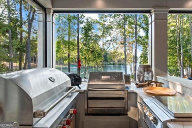 Escape to a private, peaceful lakefront sanctuary in Reynolds on Reynolds Lake Oconee - The Oconee in Georgia - for sale on GolfHomes.com, golf home, golf lot