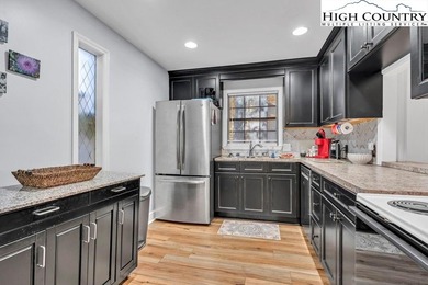 Beautiful Condo Overlooking Beech Mountain Golf Course. Discover on Beech Mountain Club in North Carolina - for sale on GolfHomes.com, golf home, golf lot