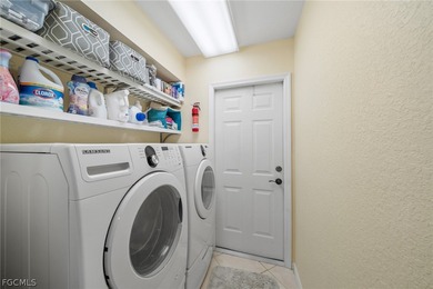 Direct Gulf Access pool home with updated kitchen and an on El Rio Golf Course and Club in Florida - for sale on GolfHomes.com, golf home, golf lot