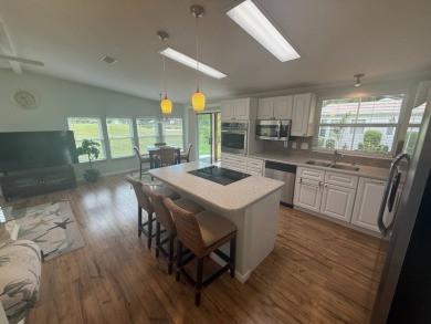 This beautiful Palm Harbor stucco is ready for new owners to on Del Tura Golf and Country Club in Florida - for sale on GolfHomes.com, golf home, golf lot