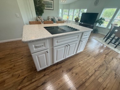 This beautiful Palm Harbor stucco is ready for new owners to on Del Tura Golf and Country Club in Florida - for sale on GolfHomes.com, golf home, golf lot
