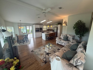 This beautiful Palm Harbor stucco is ready for new owners to on Del Tura Golf and Country Club in Florida - for sale on GolfHomes.com, golf home, golf lot