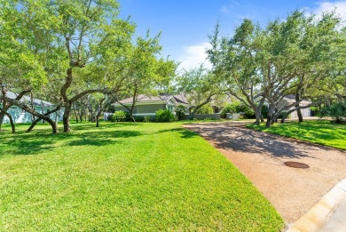 A lakeside oasis with expansive golf course views.  Over half an on Rockport Country Club in Texas - for sale on GolfHomes.com, golf home, golf lot