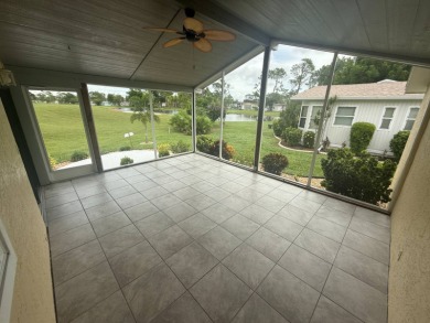 This beautiful Palm Harbor stucco is ready for new owners to on Del Tura Golf and Country Club in Florida - for sale on GolfHomes.com, golf home, golf lot