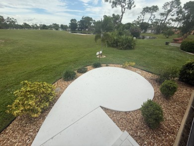 This beautiful Palm Harbor stucco is ready for new owners to on Del Tura Golf and Country Club in Florida - for sale on GolfHomes.com, golf home, golf lot