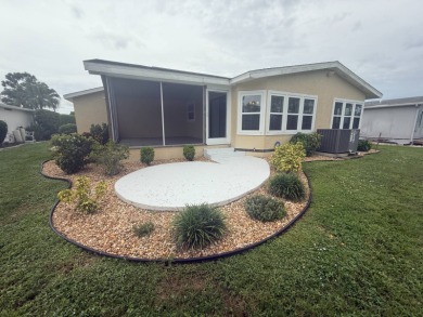 This beautiful Palm Harbor stucco is ready for new owners to on Del Tura Golf and Country Club in Florida - for sale on GolfHomes.com, golf home, golf lot