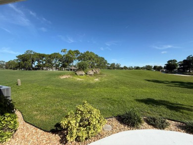This beautiful Palm Harbor stucco is ready for new owners to on Del Tura Golf and Country Club in Florida - for sale on GolfHomes.com, golf home, golf lot