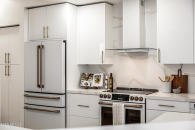 Experience luxury living in this fully remodeled townhome in the on Gainey Ranch Golf Club in Arizona - for sale on GolfHomes.com, golf home, golf lot