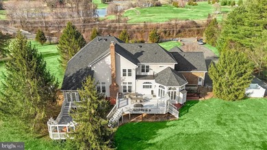 Stately brick-front colonial set on a premium 5-acre lot backing on Twin Lakes Golf Course  in Virginia - for sale on GolfHomes.com, golf home, golf lot