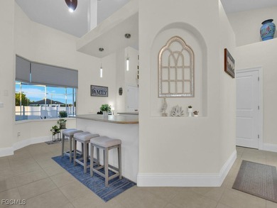 Experience Florida living at its finest in this stunning on Del Tura Golf and Country Club in Florida - for sale on GolfHomes.com, golf home, golf lot