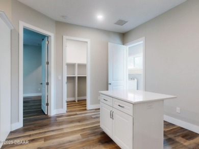 Country living meets modern convenience in this serene wooded on New Smyrna Beach Golf Course in Florida - for sale on GolfHomes.com, golf home, golf lot
