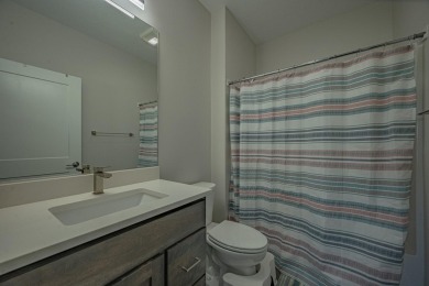 Welcome to this stunning, modern home located in the highly on Whispering Creek Golf Club in Iowa - for sale on GolfHomes.com, golf home, golf lot