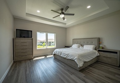 Welcome to this stunning, modern home located in the highly on Whispering Creek Golf Club in Iowa - for sale on GolfHomes.com, golf home, golf lot