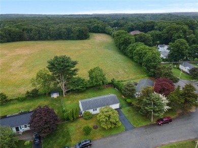 WELCOME HOME!! Don't miss the opportunity to make this on Potowomut Golf Club in Rhode Island - for sale on GolfHomes.com, golf home, golf lot