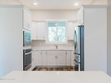 Country living meets modern convenience in this serene wooded on New Smyrna Beach Golf Course in Florida - for sale on GolfHomes.com, golf home, golf lot