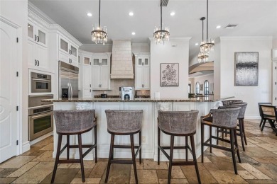 Welcome to this extraordinary 5-bedroom, 5 full bathroom and 2 on ChampionsGate Golf Resort in Florida - for sale on GolfHomes.com, golf home, golf lot