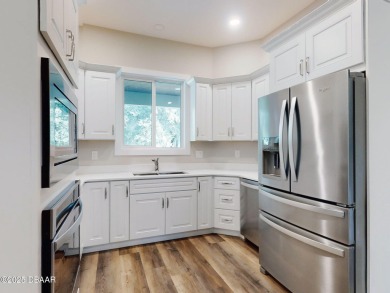 Country living meets modern convenience in this serene wooded on New Smyrna Beach Golf Course in Florida - for sale on GolfHomes.com, golf home, golf lot