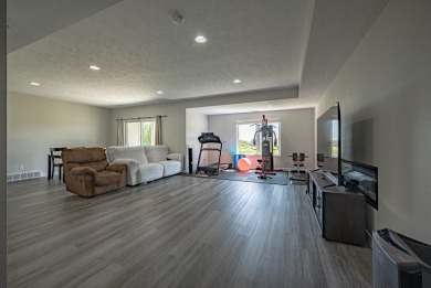 Welcome to this stunning, modern home located in the highly on Whispering Creek Golf Club in Iowa - for sale on GolfHomes.com, golf home, golf lot