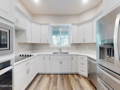 Country living meets modern convenience in this serene wooded on New Smyrna Beach Golf Course in Florida - for sale on GolfHomes.com, golf home, golf lot