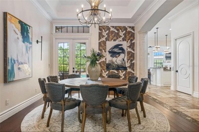 Welcome to this extraordinary 5-bedroom, 5 full bathroom and 2 on ChampionsGate Golf Resort in Florida - for sale on GolfHomes.com, golf home, golf lot