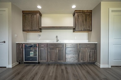 Welcome to this stunning, modern home located in the highly on Whispering Creek Golf Club in Iowa - for sale on GolfHomes.com, golf home, golf lot
