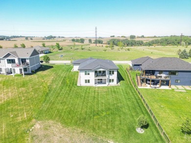 Welcome to this stunning, modern home located in the highly on Whispering Creek Golf Club in Iowa - for sale on GolfHomes.com, golf home, golf lot
