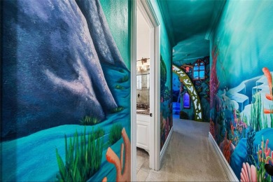 Welcome to this extraordinary 5-bedroom, 5 full bathroom and 2 on ChampionsGate Golf Resort in Florida - for sale on GolfHomes.com, golf home, golf lot