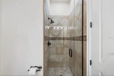 Welcome to this extraordinary 5-bedroom, 5 full bathroom and 2 on ChampionsGate Golf Resort in Florida - for sale on GolfHomes.com, golf home, golf lot