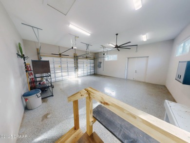 Country living meets modern convenience in this serene wooded on New Smyrna Beach Golf Course in Florida - for sale on GolfHomes.com, golf home, golf lot