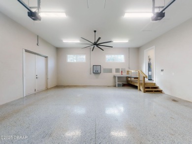 Country living meets modern convenience in this serene wooded on New Smyrna Beach Golf Course in Florida - for sale on GolfHomes.com, golf home, golf lot