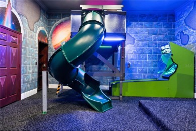 Welcome to this extraordinary 5-bedroom, 5 full bathroom and 2 on ChampionsGate Golf Resort in Florida - for sale on GolfHomes.com, golf home, golf lot