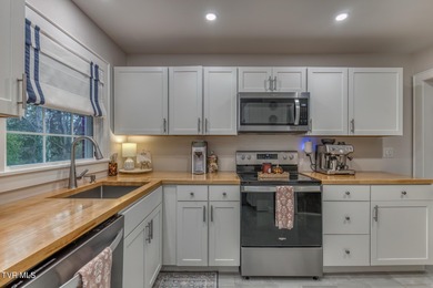 Welcome Home! This a beautifully updated 3-bedroom, 1.5-bath on Elizabethton Municipal Golf Club in Tennessee - for sale on GolfHomes.com, golf home, golf lot