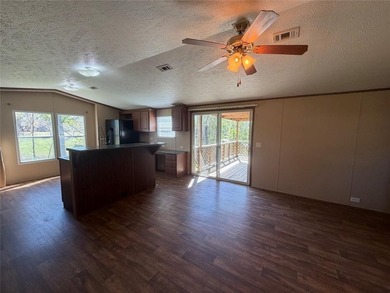 Discover the perfect waterfront getaway on Lake Fork! This on Links At Lands End in Texas - for sale on GolfHomes.com, golf home, golf lot