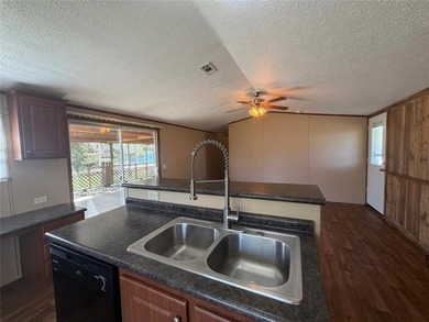 Discover the perfect waterfront getaway on Lake Fork! This on Links At Lands End in Texas - for sale on GolfHomes.com, golf home, golf lot