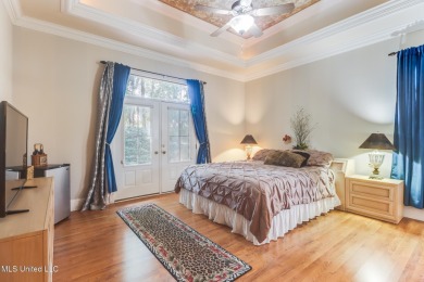 This beautiful Custom Home in Diamondhead has elegant upgrades on Diamondhead Country Club in Mississippi - for sale on GolfHomes.com, golf home, golf lot