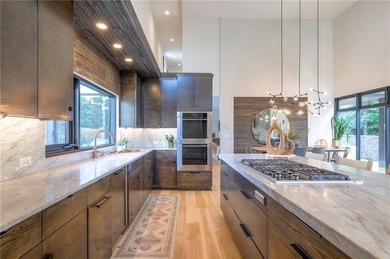 Exquisite 7,100 Sq Ft Modern Estate in the gated Loch Lloyd on Loch Lloyd Country Club in Missouri - for sale on GolfHomes.com, golf home, golf lot