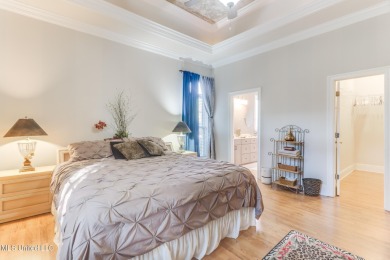 This beautiful Custom Home in Diamondhead has elegant upgrades on Diamondhead Country Club in Mississippi - for sale on GolfHomes.com, golf home, golf lot