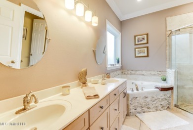 This beautiful Custom Home in Diamondhead has elegant upgrades on Diamondhead Country Club in Mississippi - for sale on GolfHomes.com, golf home, golf lot