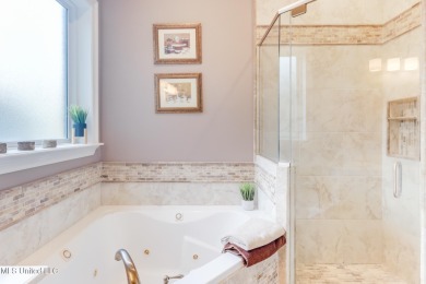 This beautiful Custom Home in Diamondhead has elegant upgrades on Diamondhead Country Club in Mississippi - for sale on GolfHomes.com, golf home, golf lot
