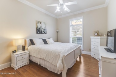 This beautiful Custom Home in Diamondhead has elegant upgrades on Diamondhead Country Club in Mississippi - for sale on GolfHomes.com, golf home, golf lot