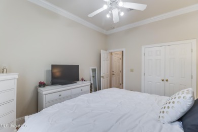 This beautiful Custom Home in Diamondhead has elegant upgrades on Diamondhead Country Club in Mississippi - for sale on GolfHomes.com, golf home, golf lot