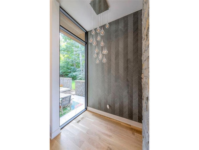 Exquisite 7,100 Sq Ft Modern Estate in the gated Loch Lloyd on Loch Lloyd Country Club in Missouri - for sale on GolfHomes.com, golf home, golf lot