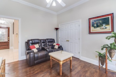 This beautiful Custom Home in Diamondhead has elegant upgrades on Diamondhead Country Club in Mississippi - for sale on GolfHomes.com, golf home, golf lot