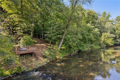 Escape city living in this stunning 2 bed/2 bath cabin plus loft on White Path Golf Club in Georgia - for sale on GolfHomes.com, golf home, golf lot