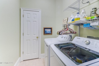 This beautiful Custom Home in Diamondhead has elegant upgrades on Diamondhead Country Club in Mississippi - for sale on GolfHomes.com, golf home, golf lot