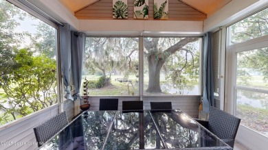 Discover luxury meets nature in this turnkey fully furnished on The Great Outdoors Golf and Country Club in Florida - for sale on GolfHomes.com, golf home, golf lot